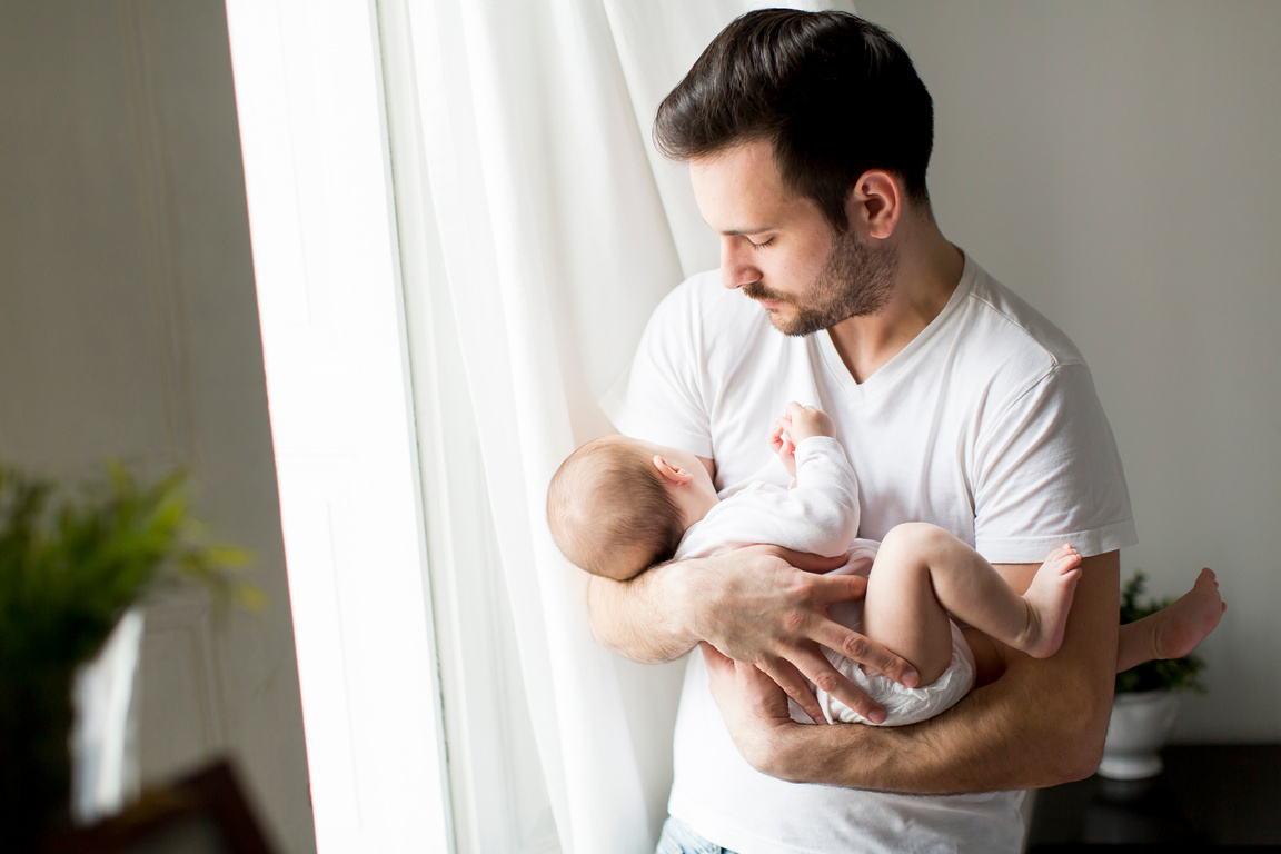 Father and Newborn Baby